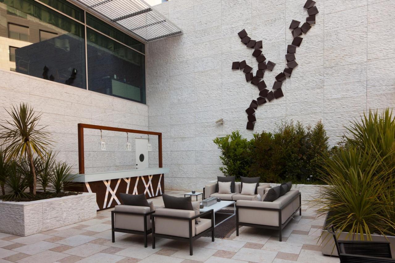 Epic Sana Lisboa Hotel Bagian luar foto The interior courtyard