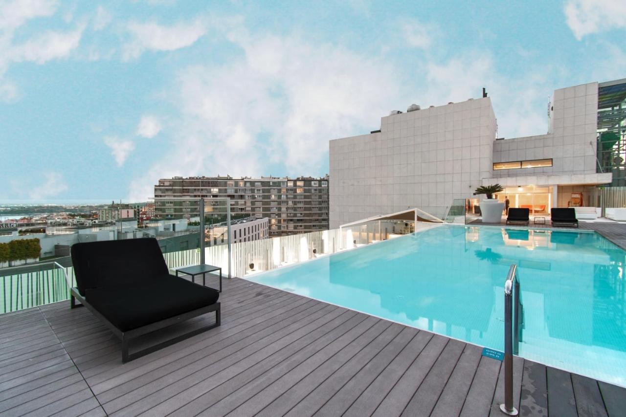 Epic Sana Lisboa Hotel Bagian luar foto Rooftop pool